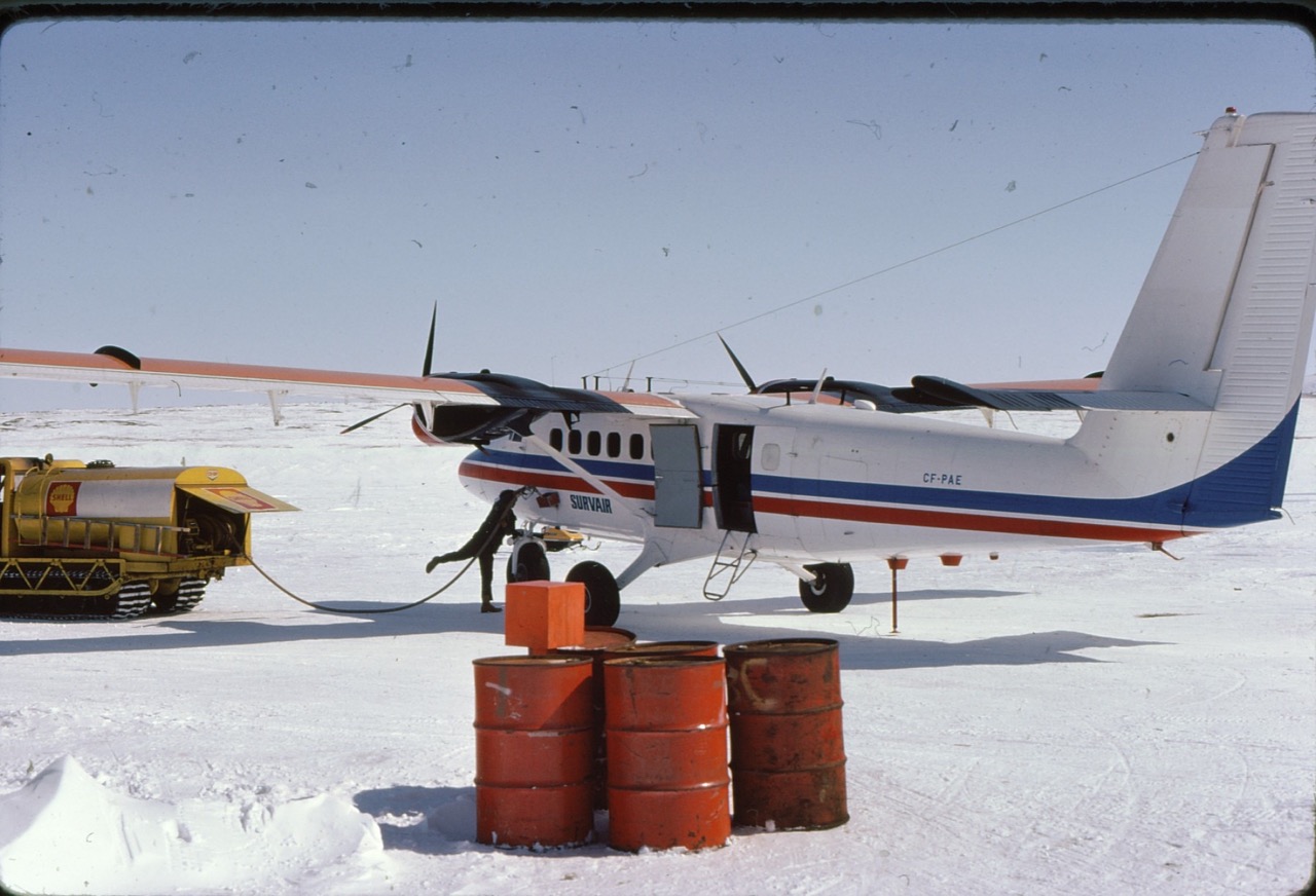 628d235a8db24b99c7b0ed70_Twin Otter refueling from furnace oil truck, Inukjuak `75 Large