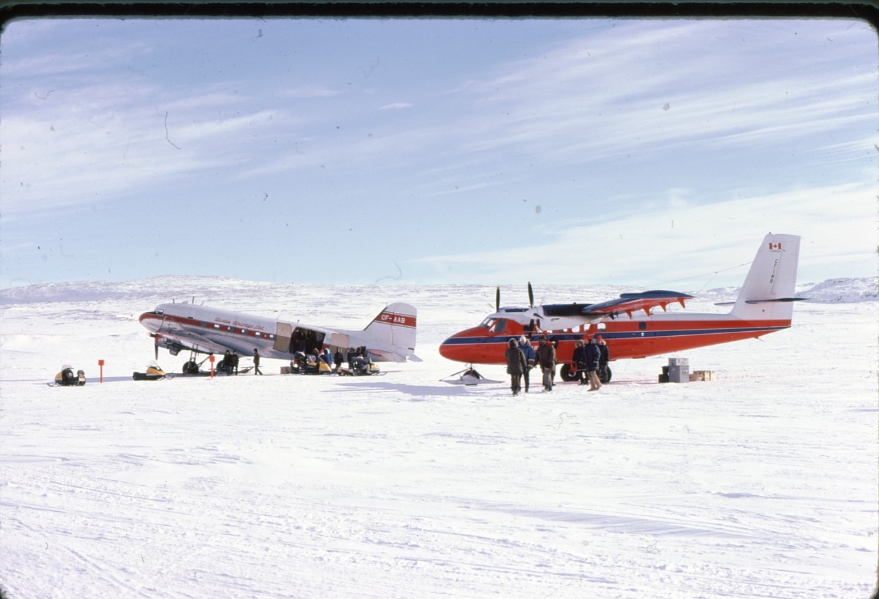 628d25d8754126d9f56d63fd_Busy airport on ice, Inuksuak river, winter `75 Large