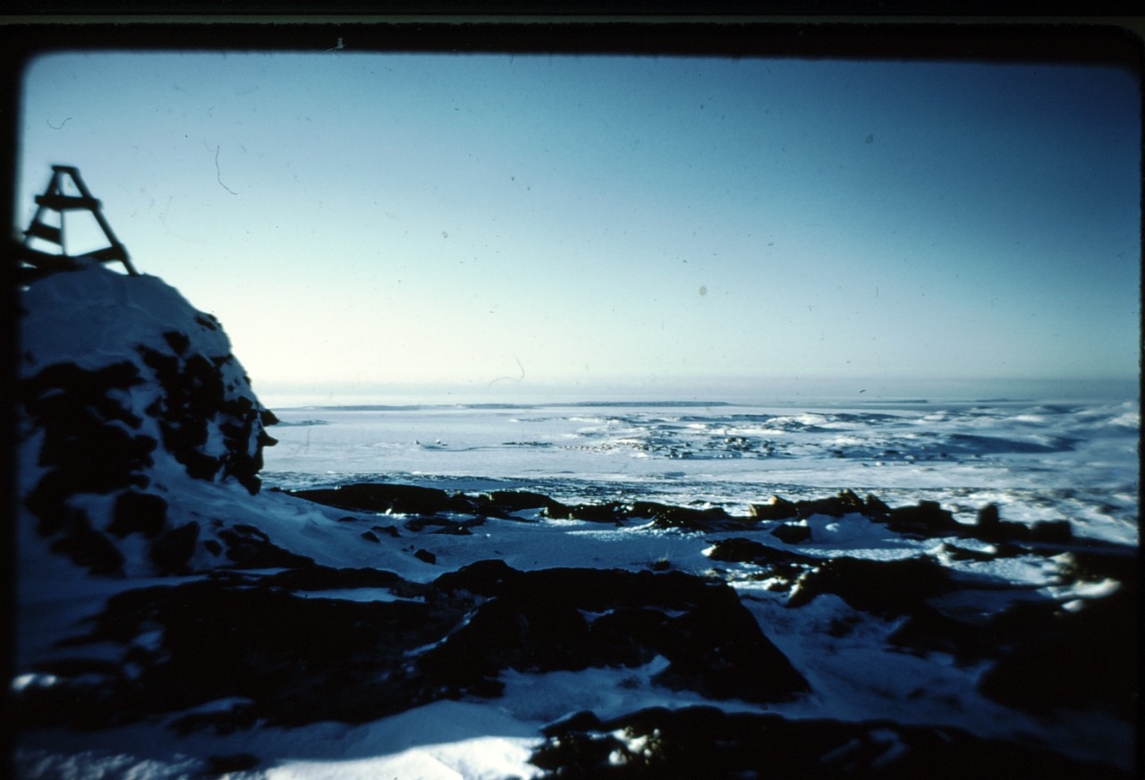 628d285765091dbbf194a691_Inukjuak village seen from Beacon Hill, winter `75 Large